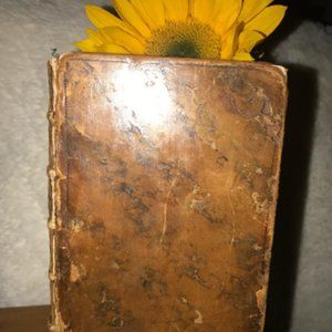 hardcover vintage book in 1748 with original calfskin leather cover